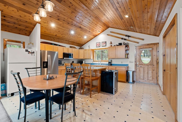 112 Glen View Dr, Eureka, MT 59917 - dining room with wood ceiling, high vaulted ceiling, light floors, and recessed lighting