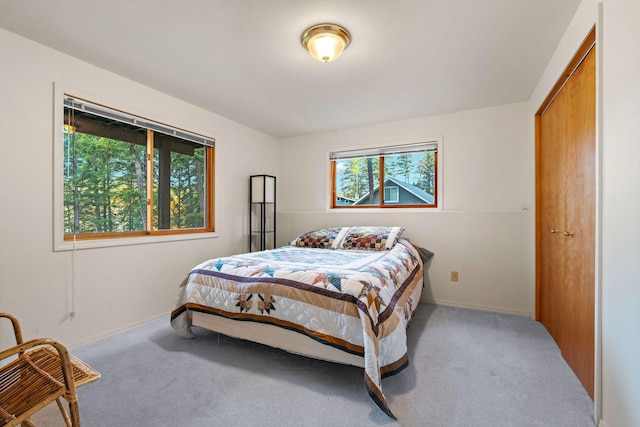 112 Glen View Dr, Eureka, MT 59917 - carpeted bedroom featuring baseboards