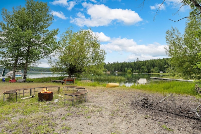 112 Glen View Dr, Eureka, MT 59917 - view of yard featuring a forest view, a water view, and a fire pit