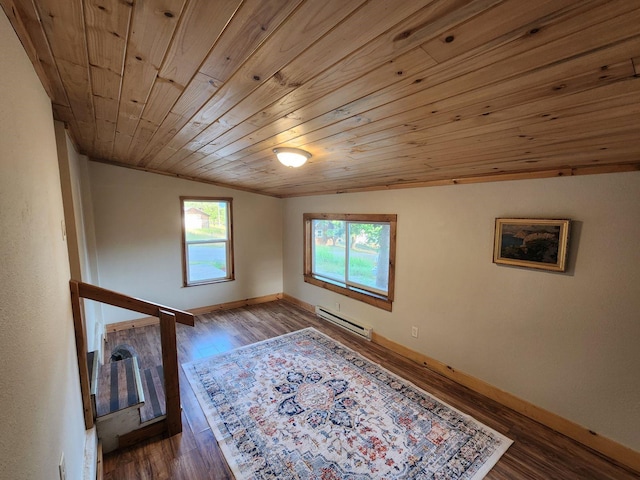 213 Washington St, Thompson Falls, MT 59873 - unfurnished room featuring vaulted ceiling, wood finished floors, wooden ceiling, a baseboard heating unit, and baseboards