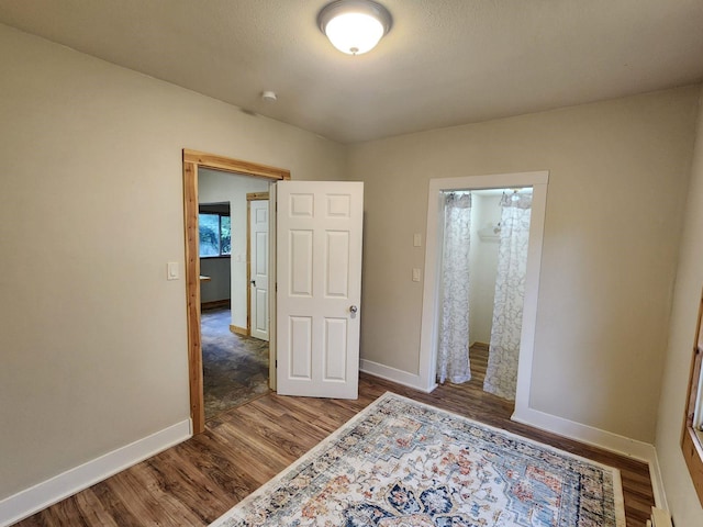 213 Washington St, Thompson Falls, MT 59873 - bedroom featuring wood finished floors and baseboards