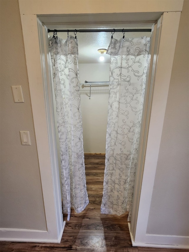 bathroom featuring wood-type flooring