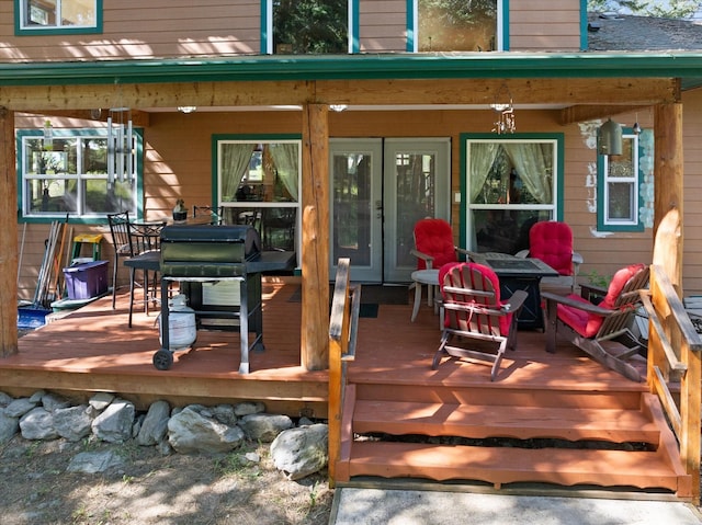 wooden terrace with covered porch and grilling area