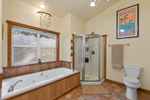 bathroom with separate shower and tub, vaulted ceiling, and toilet