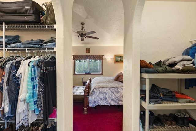 carpeted bedroom with ceiling fan