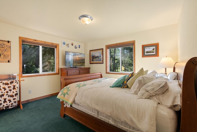 bedroom featuring dark carpet