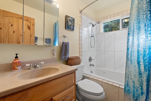 full bathroom featuring shower / bath combo, toilet, and vanity