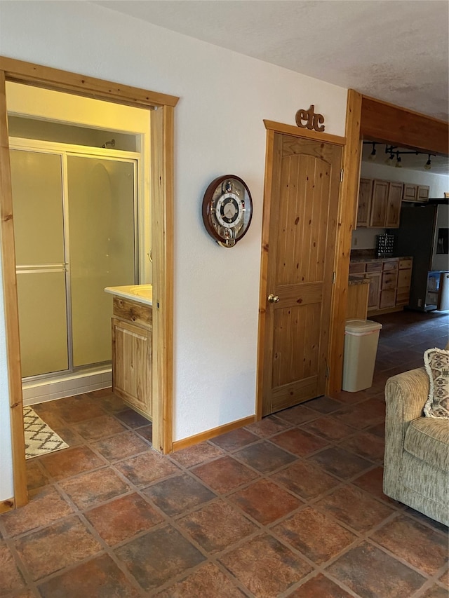 interior space with dark tile patterned floors