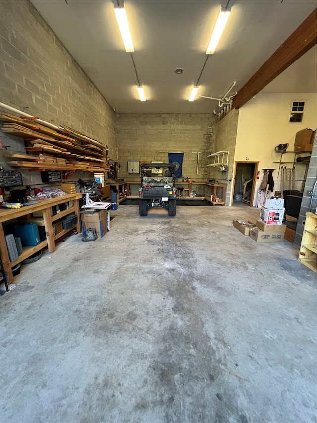 garage with a workshop area