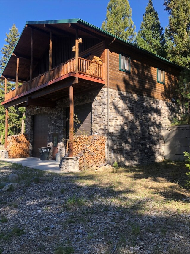 rear view of house with a patio