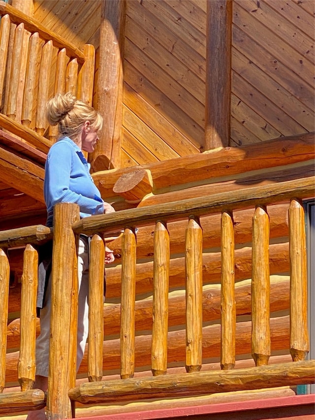 staircase with wooden walls