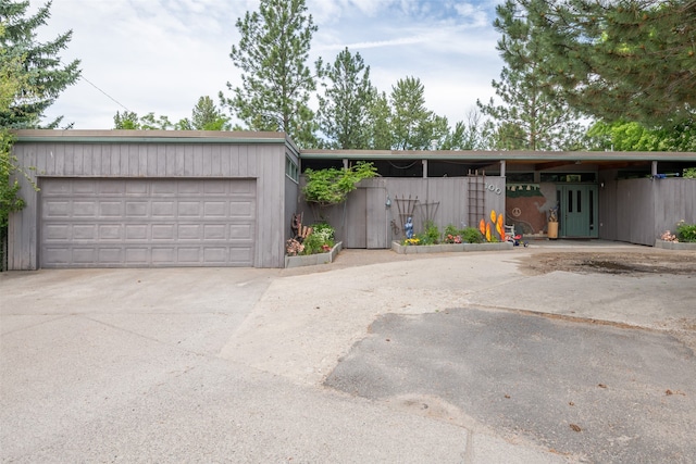 ranch-style house featuring a garage