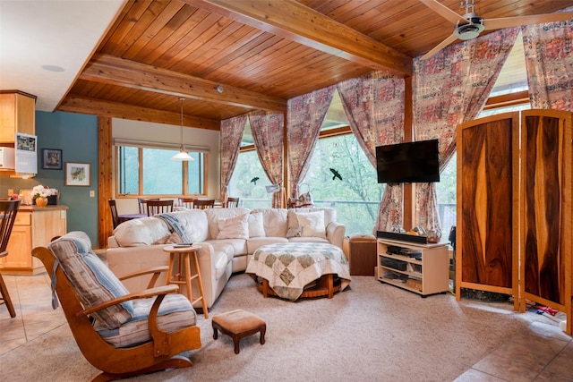 tiled living room with beam ceiling, wooden ceiling, and ceiling fan