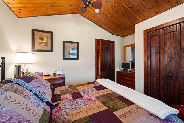 bedroom with lofted ceiling and wooden ceiling