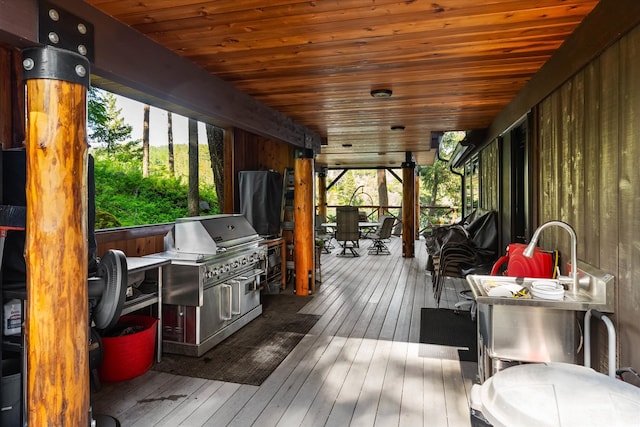 interior space with wood ceiling and a wealth of natural light