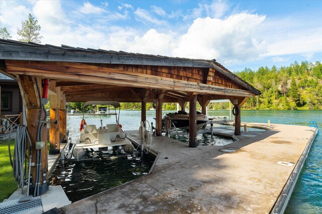 dock area featuring a water view