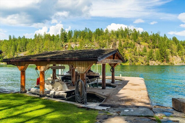 dock area featuring a water view