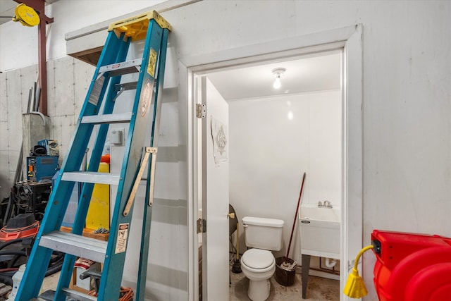 bathroom featuring toilet