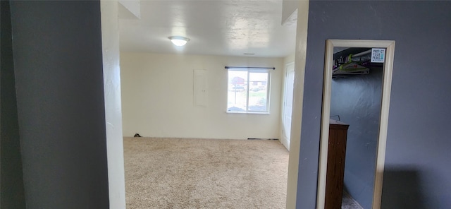 spare room featuring carpet