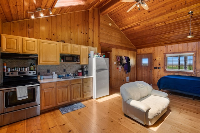 kitchen featuring hanging light fixtures, lofted ceiling with beams, white fridge, electric stove, and light wood-type flooring