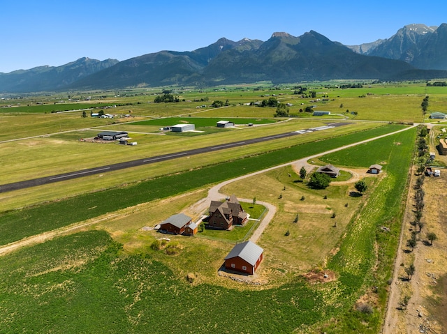 bird's eye view with a mountain view and a rural view