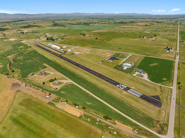 birds eye view of property featuring a rural view