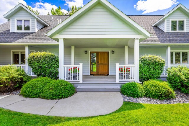 view of front of property featuring covered porch