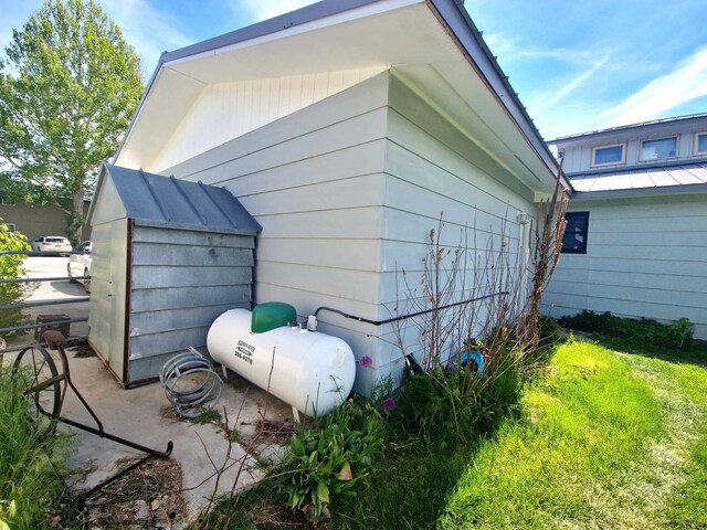 512 S Oak St, Townsend, MT 59644 - view of home's exterior with a standing seam roof and metal roof