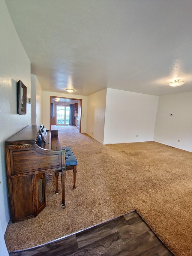 512 S Oak St, Townsend, MT 59644 - interior space with dark carpet