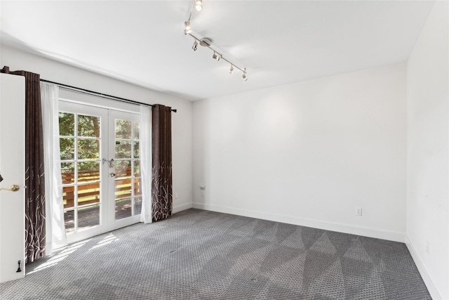 963 Colorado Ave, Whitefish, MT 59937 - spare room with carpet floors and french doors