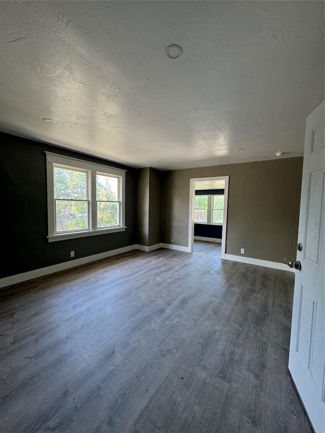 empty room featuring a textured ceiling