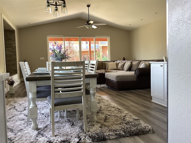 interior space featuring vaulted ceiling, dark hardwood / wood-style flooring, and ceiling fan