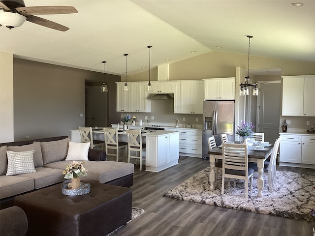 interior space with sink, dark wood-type flooring, ceiling fan, and vaulted ceiling