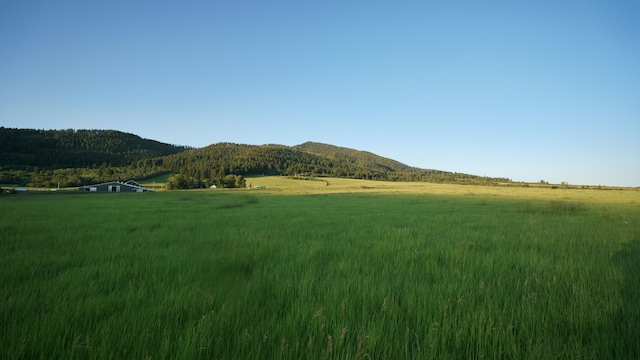 mountain view with a rural view