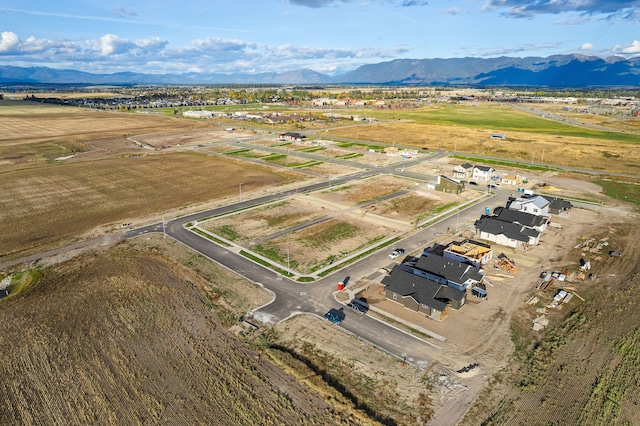 drone / aerial view featuring a mountain view