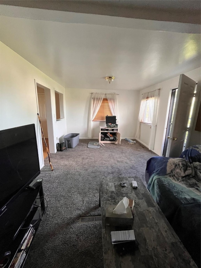 unfurnished living room with carpet flooring