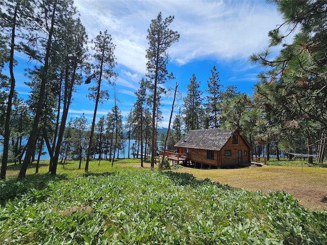 view of yard with a wooden deck