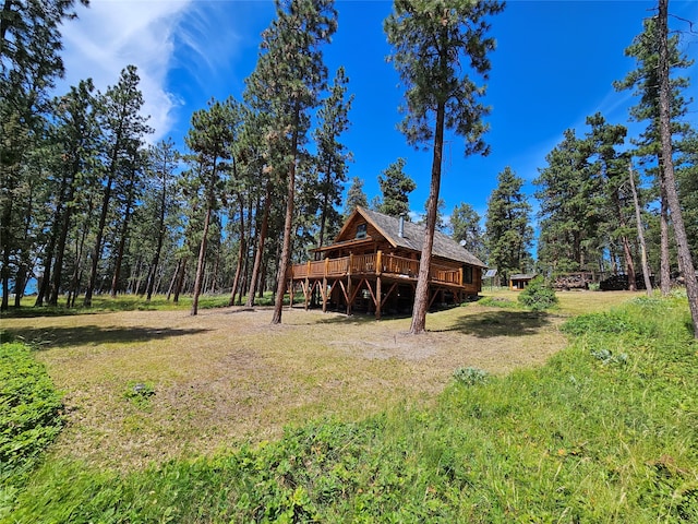 view of yard featuring a wooden deck