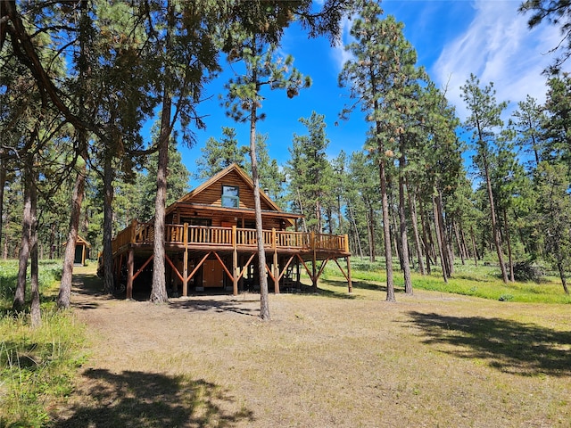 rear view of property with a deck