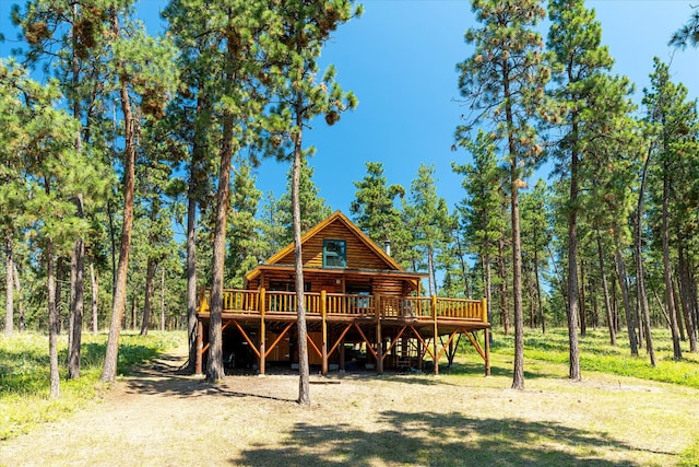 rear view of house with a deck