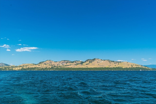 property view of water featuring a mountain view