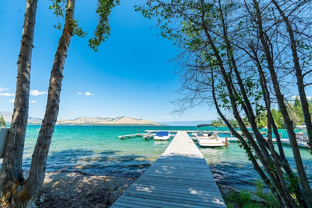 view of dock with a water view