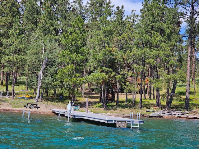 view of dock with a water view