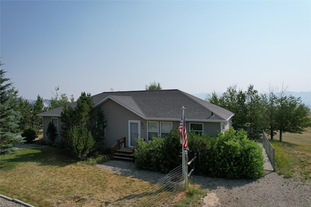 view of front of house with a front lawn