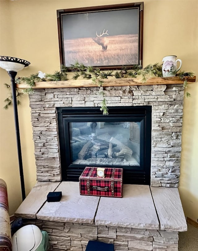 interior details with a fireplace