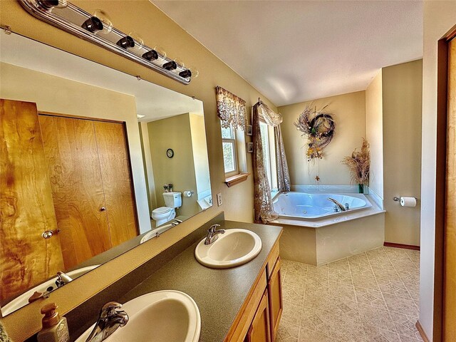 bathroom featuring tile patterned flooring, a mountain view, and vanity