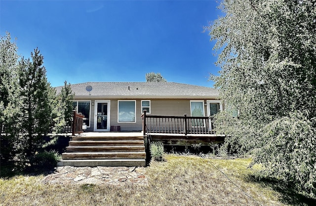 view of front of house featuring a wooden deck