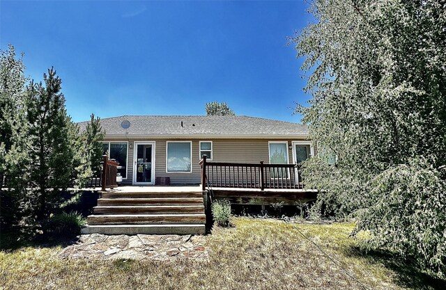 view of front of house with a wooden deck