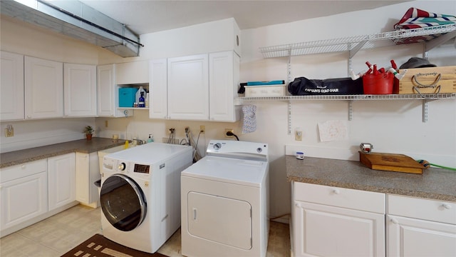 laundry area featuring cabinet space and independent washer and dryer