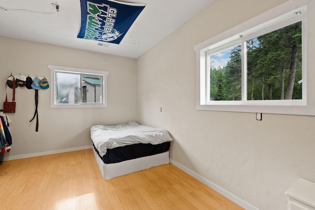 bedroom featuring hardwood / wood-style floors